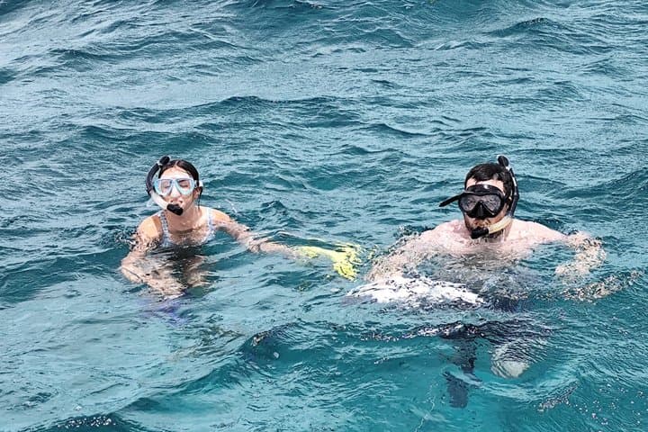 BBQ & Blue Water: Private 6-Hour BBQ, Snorkel & Fishing Charter in Providenciales photo 2