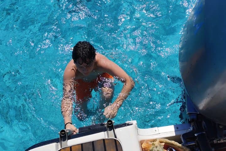 BBQ & Blue Water: Private 6-Hour BBQ, Snorkel & Fishing Charter in Providenciales photo 6