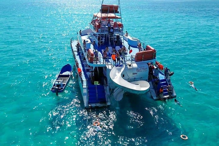 Isla Mujeres Dancer Cruise: Catamaran Party with Snorkeling, Lunch & Open Bar photo 1