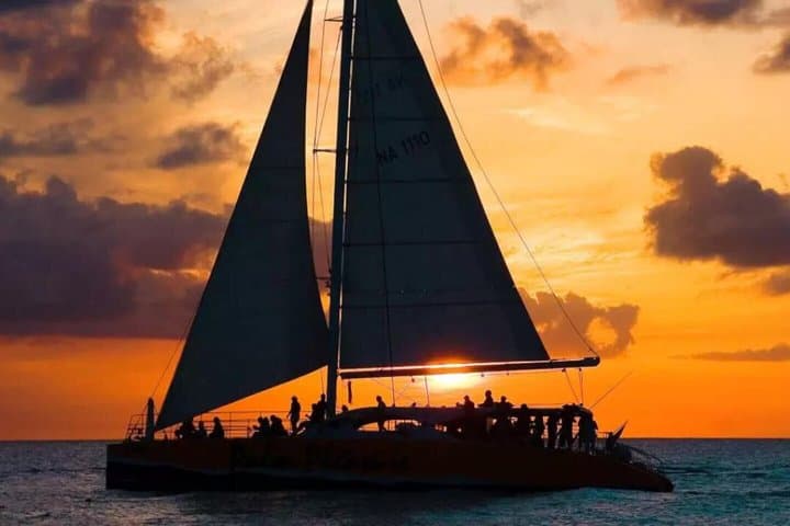 Santorini Catamaran Sunset Cruise: Dinner, Snorkeling & Hot Springs