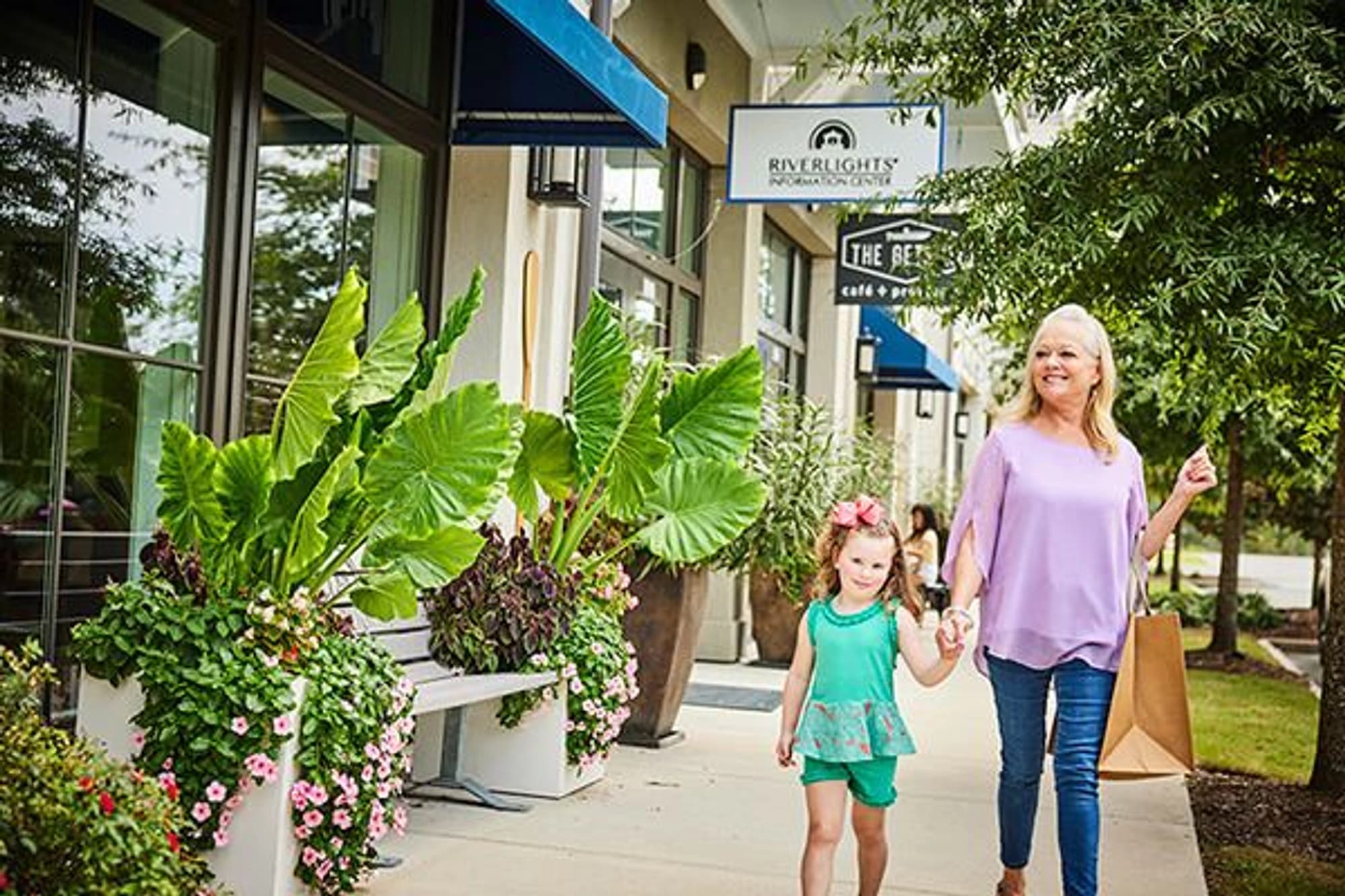 Townhomes and single-family houses lining the lake with a three-mile loop and dog park at Riverlights Wilmington NC