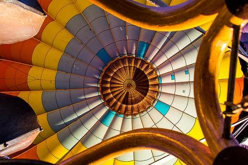 View inside hot air balloon envelope showing vibrant color panels