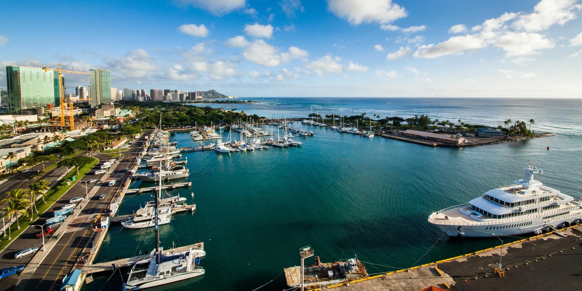Aerial harbor view of Waikiki marina with glass-bottom boats