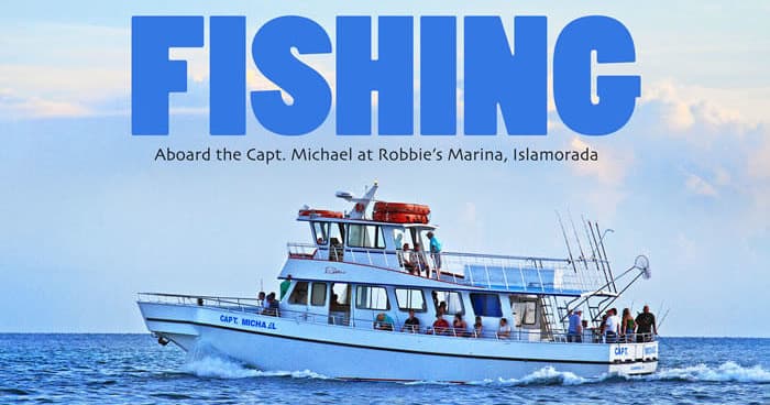 Fishing charter boat cruising offshore tropical waters for anglers