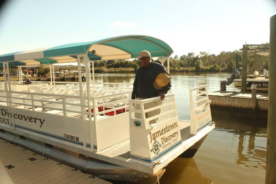 Docked Jamestown Discovery riverboat at marina boarding passengers