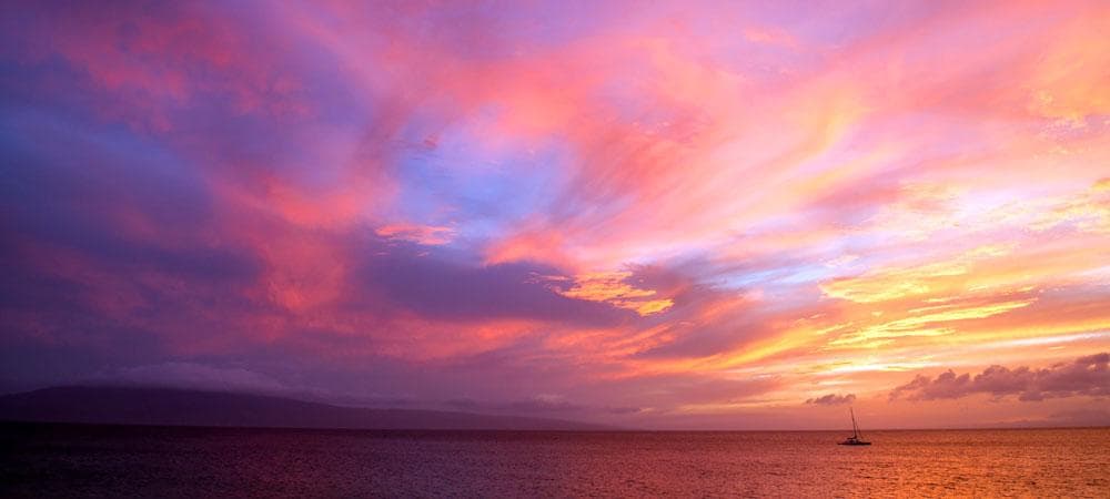Vibrant sunset over Pacific Ocean near Lahaina waterfront