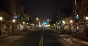 Empty historic downtown street at night on guided ghost walk
