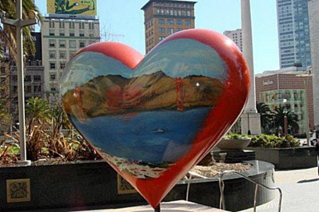 Painted heart sculpture public art in San Francisco urban plaza