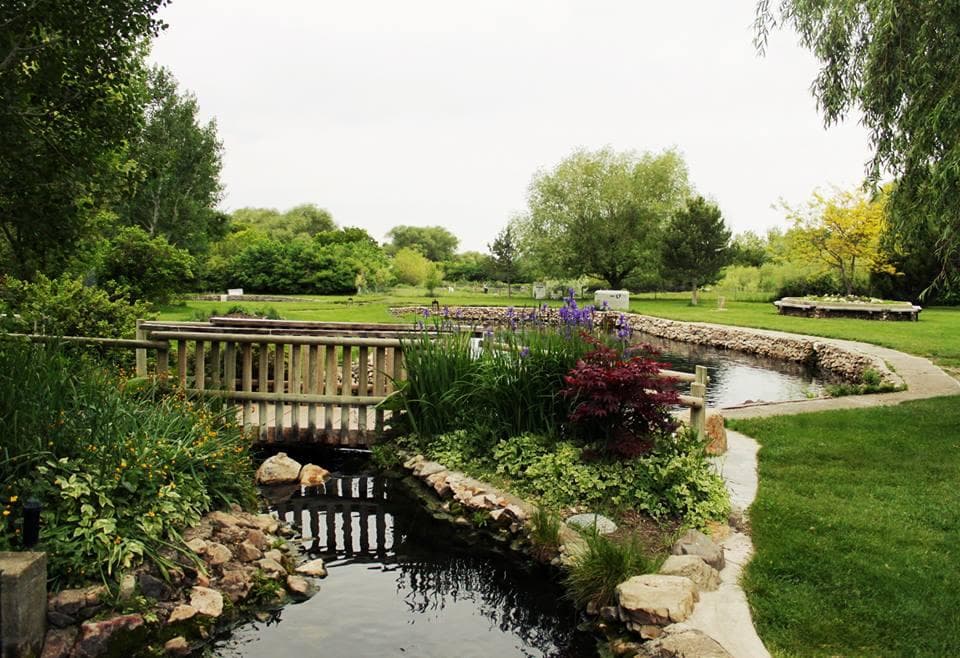 Park bridge over pond at Cold Springs Trout Farm, scenic crossing