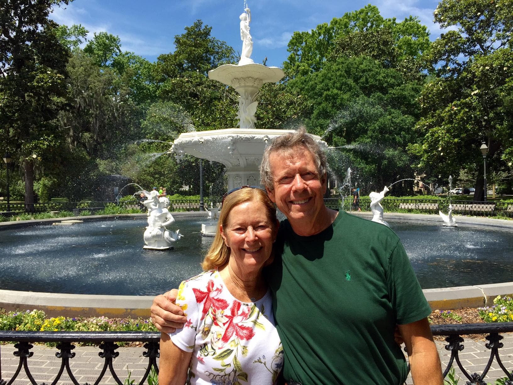 Couple posing by Forsyth Park fountain on Savannah walking tour