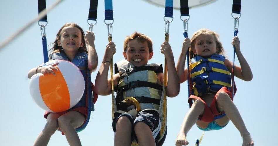 Banana Boat Rides & Dolphin Cruises with Miramar Beach Parasail