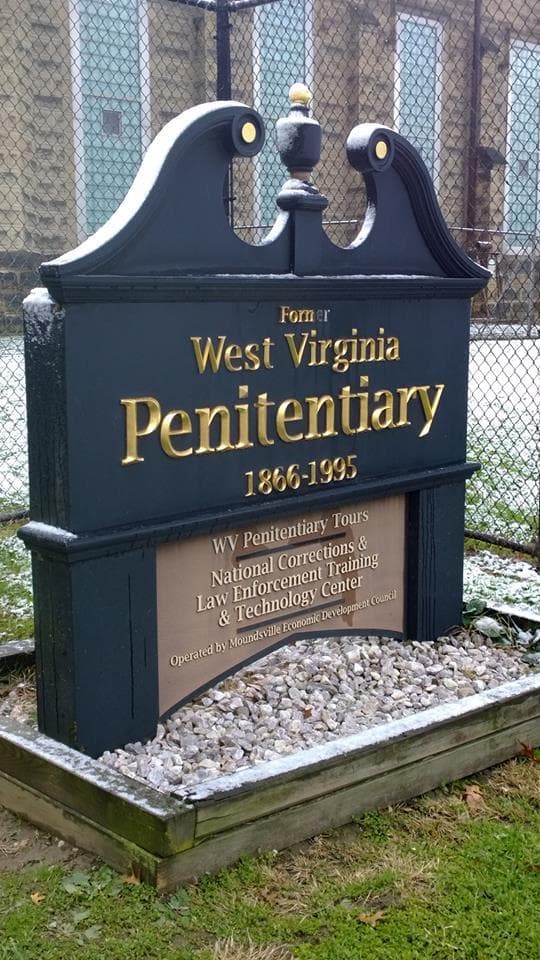 West Virginia Penitentiary entrance sign highlighting guided tours