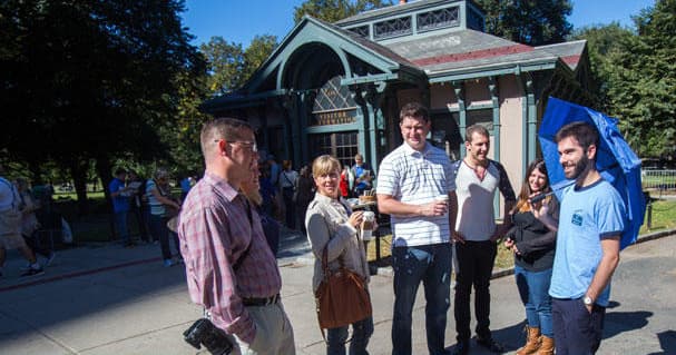 Walking tour group at Boston park pavilion on location tour