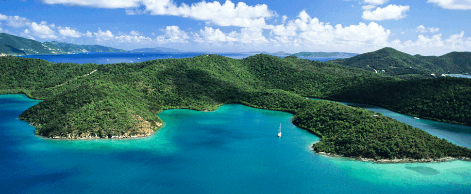 Aerial view of tropical islands and turquoise bays, scenic sailing