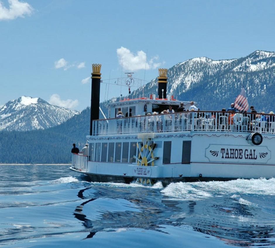 Tahoe Gal paddlewheel cruising Lake Tahoe with mountain views