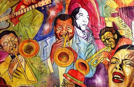 Colorful jazz mural depicting musicians on urban exterior wall