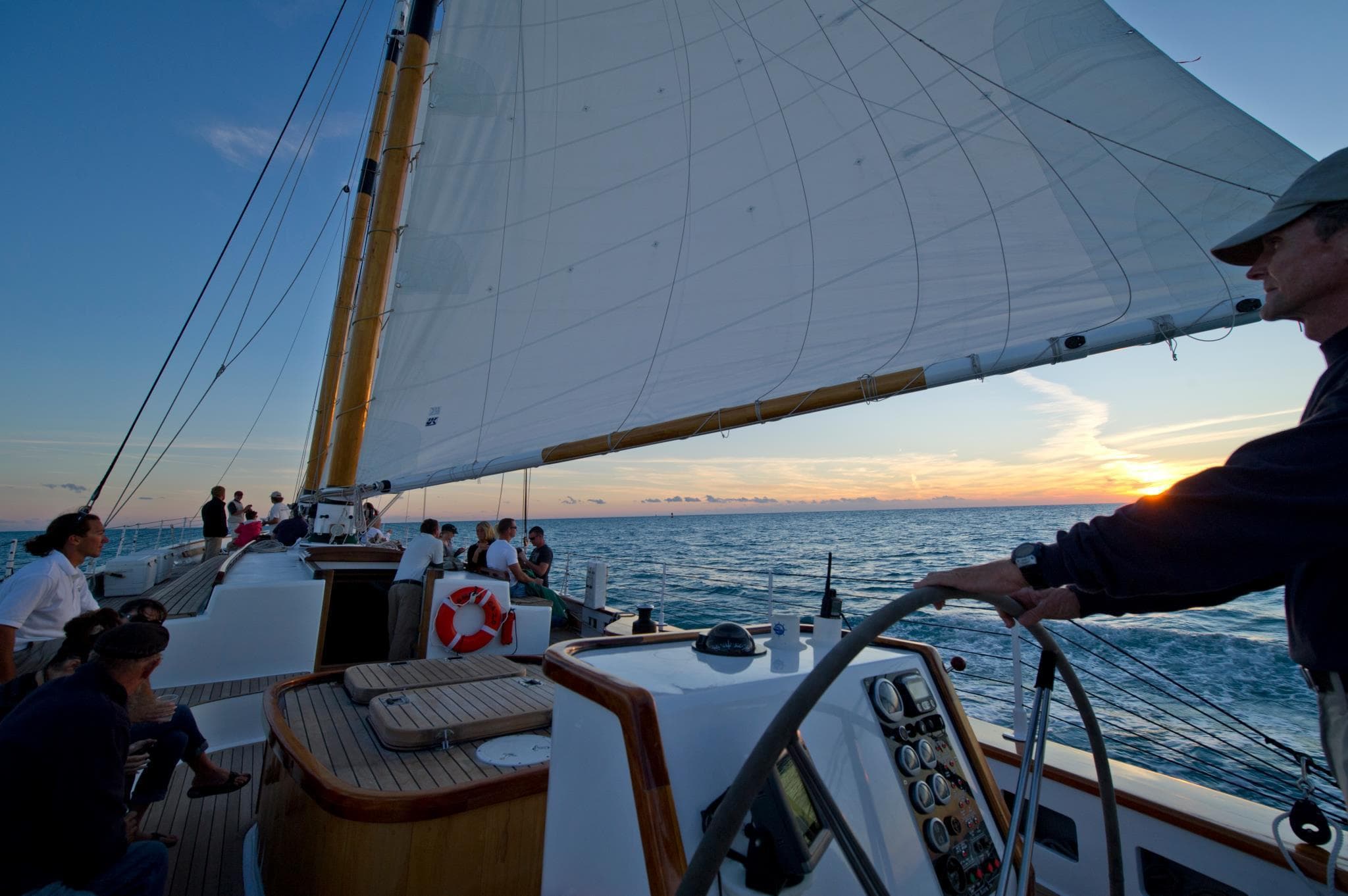 View from helm aboard schooner with sunset horizon Key West