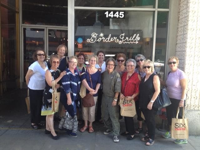 Group photo outside Border Grill entrance during culinary walking tour