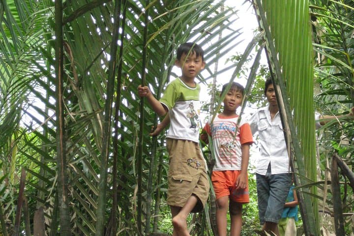 Private Mekong Delta Day Trip: Ben Tre Sampan, Cycling & Coconut Workshops photo 2