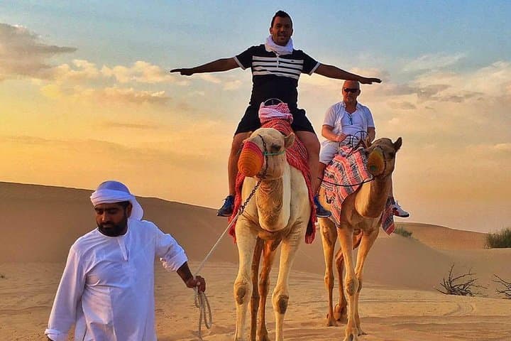 Dubai Desert Camel Caravan & BBQ Dinner Experience