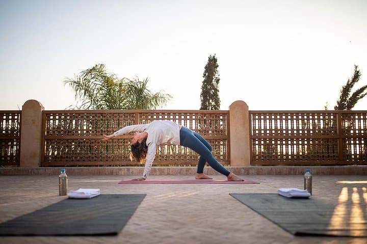 Express Yoga at La Maison Arabe: Rooftop & Pool Sessions in Marrakech photo 2