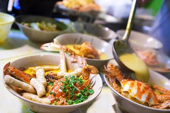 Saigon After Dark: Vespa Night Food Tour Through Chinatown and Saigon River photo 3