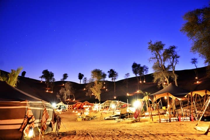 Ras Al Khaimah Desert Dinner Experience with Camel Ride & Sandboarding