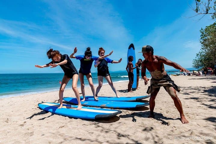 Catch the Waves: Surfing Lessons in Kuta's Tropical Paradise photo 4