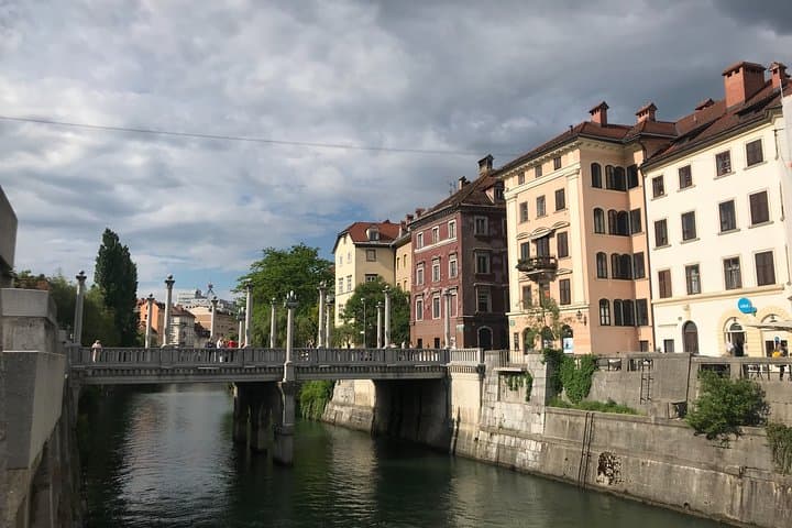 Ljubljana Walking Tour — Prešeren Square, Triple Bridge & Castle Views photo 4
