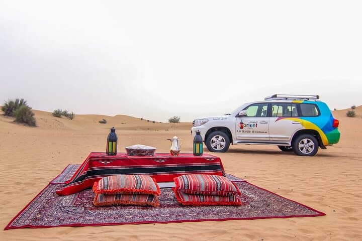 Sunset Dunes: Private Dubai Desert Safari with BBQ, Sandboarding & Camel Ride