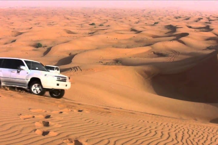 Dubai Desert Safari: Dune Bashing, Camel Ride & Sunset BBQ Experience photo 6