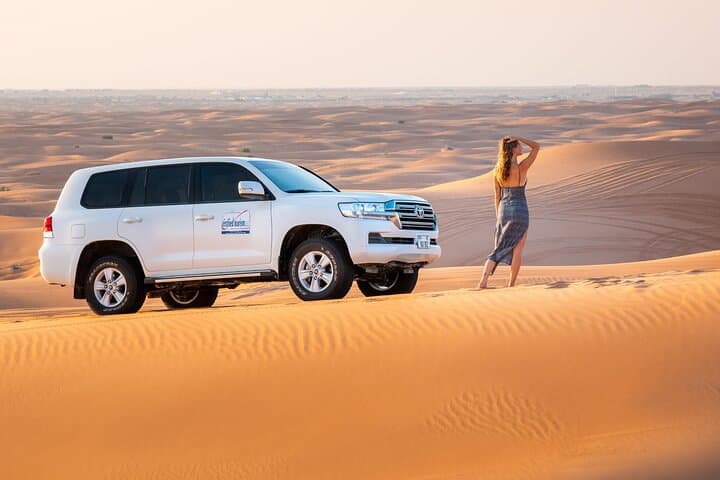 Dubai Evening Desert Safari: Dune Bashing, Camel Ride & BBQ Under the Stars