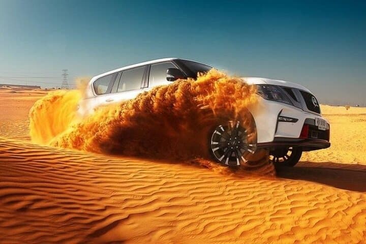 Evening Dubai Desert Safari: Dune Bashing, BBQ & Cultural Desert Camp