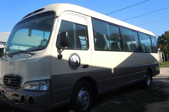 Shared Shuttle San Ignacio to Flores: Air-Conditioned Cross-Border Transfer photo 2