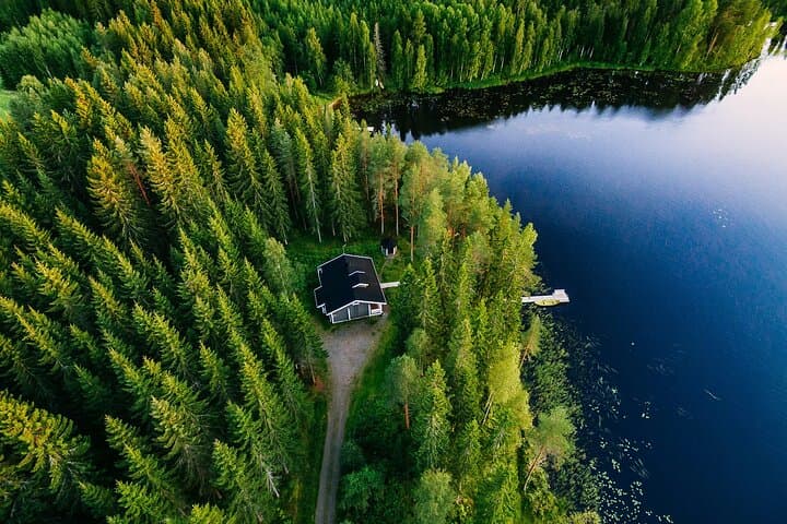 Midnight Sun Floating Experience on Forest Lake — Rovaniemi's 24-Hour Light photo 2