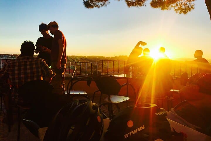 Lisbon Night Tour by Electric Bike: Sunset Miradouros & City Lights