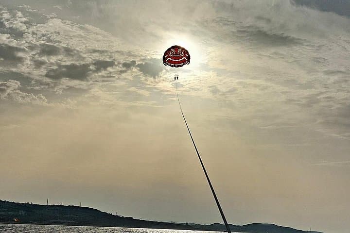 Parasail Over St. Julian's Bay: 500-Foot Views with Photos & Videos photo 4