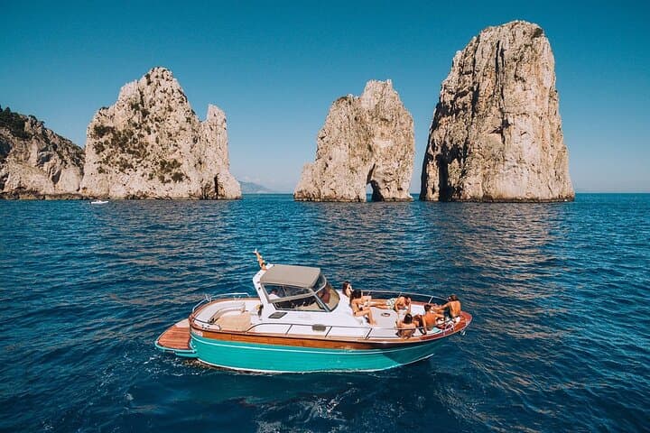 Private VIP Boat Tour of Capri: Blue Grotto, Faraglioni & Snorkel photo 3