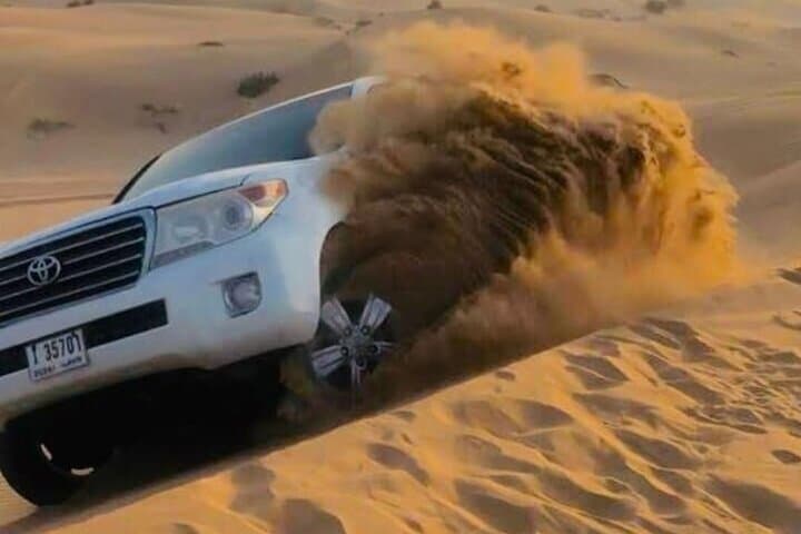 Dubai VIP Desert Safari with Quad Biking, Camel Ride & BBQ Dinner photo 3