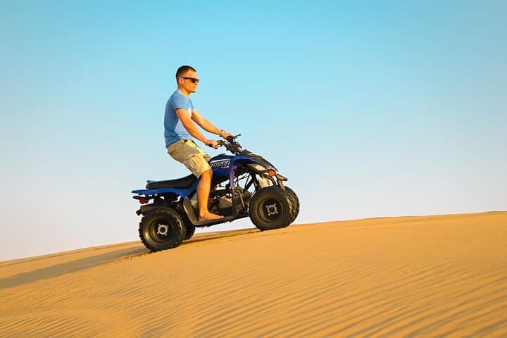 Abu Dhabi Evening Desert Safari: Dune Bashing, Camel Ride & BBQ Experience photo 3