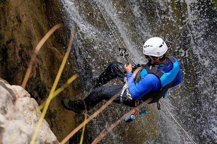 Wadi Mibam (Tiwi) Full-Day Abseil, Swim & Hidden Lake Adventure photo 1