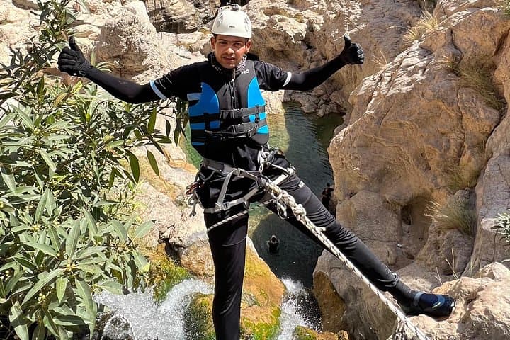 Wadi Mibam (Tiwi) Full-Day Abseil, Swim & Hidden Lake Adventure photo 3