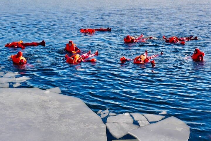 Arctic Ice Floating on Lake Saimaa — Guided Winter Float in Puumala