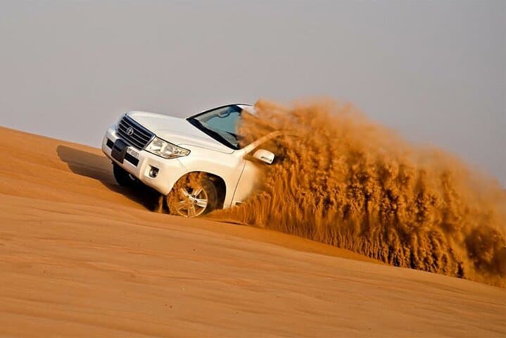 Dubai Red Dunes Safari: Dune Bashing, Sandboarding & Quad Ride photo 3