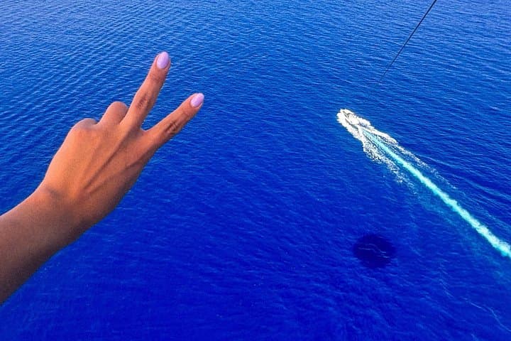 Parasail Over St. Julian's Bay: 500-Foot Views with Photos & Videos photo 1