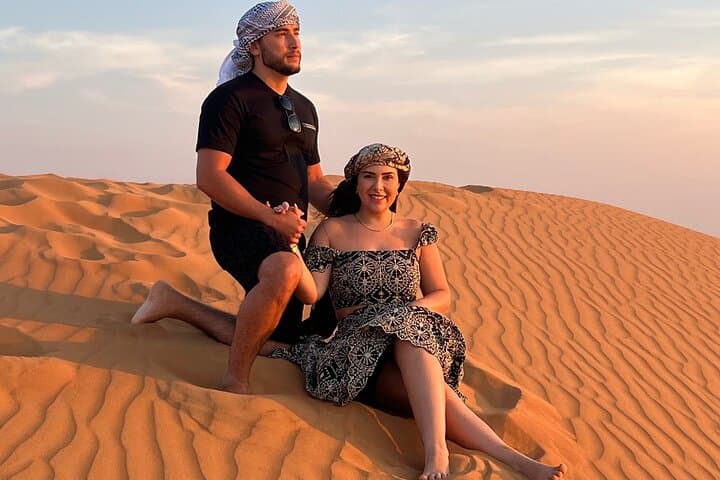 Dubai Private 4-Hour Evening Desert Safari — Dune Bashing, Sandboarding & Camel Ride photo 4