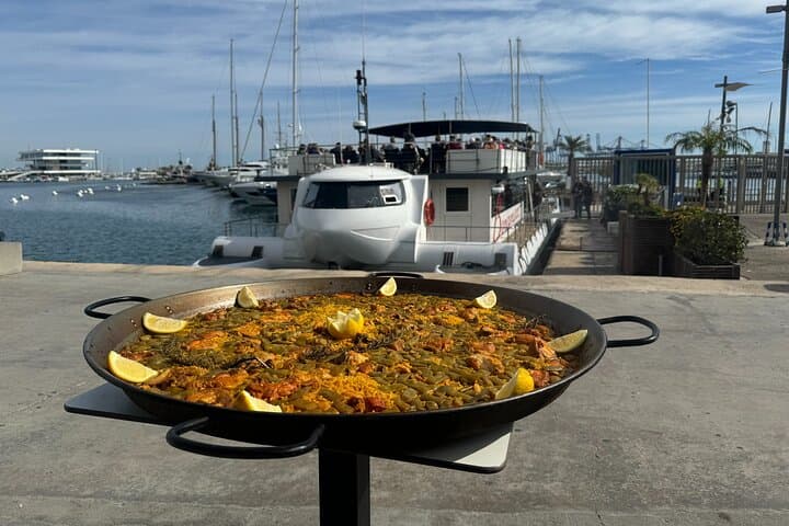 Sea lunch and swim from Denia: Cova Tallada catamaran experience