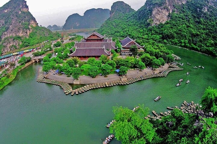 Hoa Lu to Tam Coc Luxury Day Tour — Limestone Karsts, Ancient Temples & Bamboo Boat photo 2