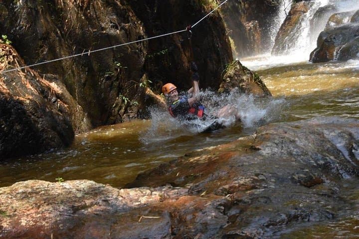 Dalat Canyoning Tour: Abseil 25m Waterfalls, Natural Slides & Cliff Jumps photo 1