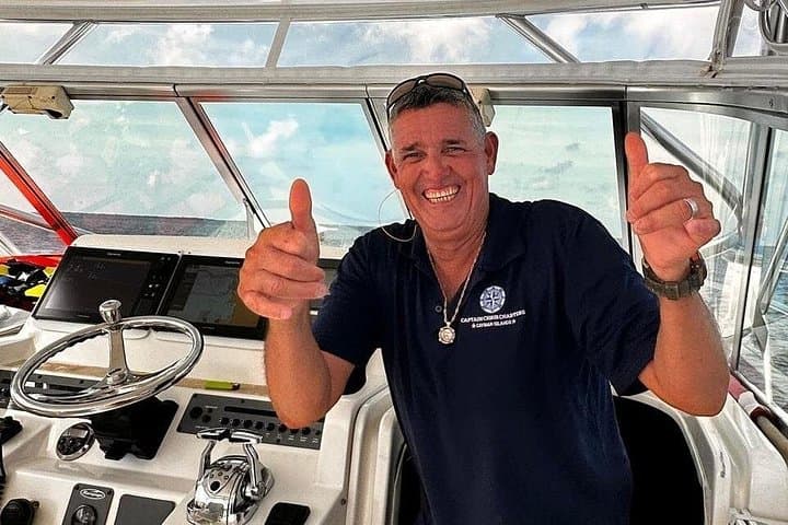 Half-Day Luxury Private Fishing Charter in Grand Cayman — Reef & Deep-Sea Options photo 3